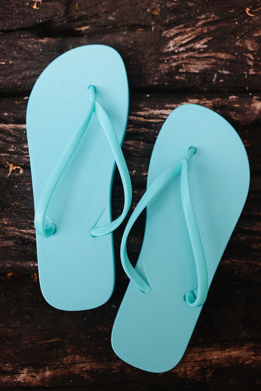 Pair of turquoise flip-flops