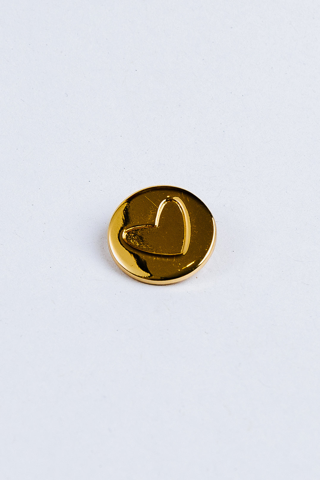 Gold heart-shaped charm