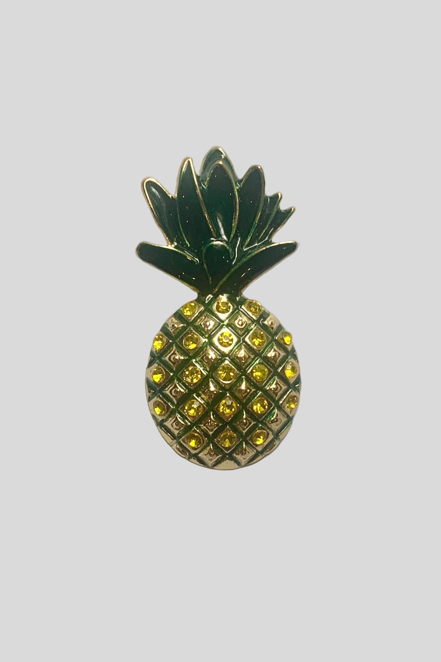 Pineapple-shaped charm with green top and yellow body
