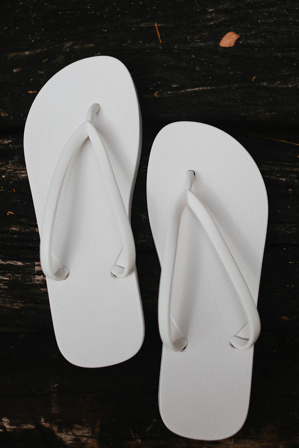 Pair of white flip-flops 